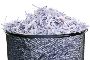 trash pale with shredded paper
