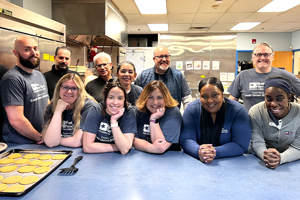 First New York Team Membmer s Volunteering at a food pantry in 2024